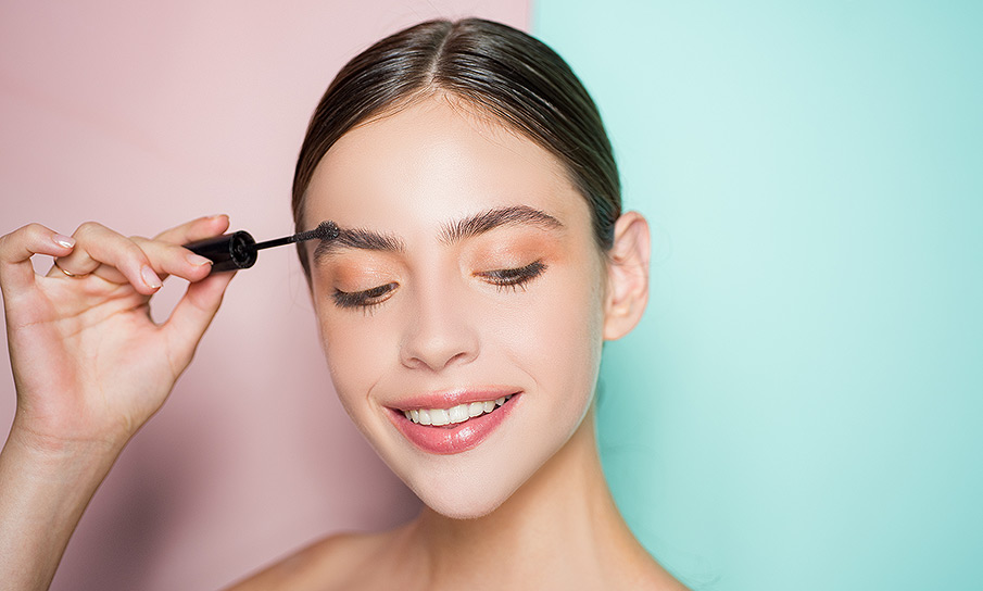 Woman learning to shape and style eyebrows